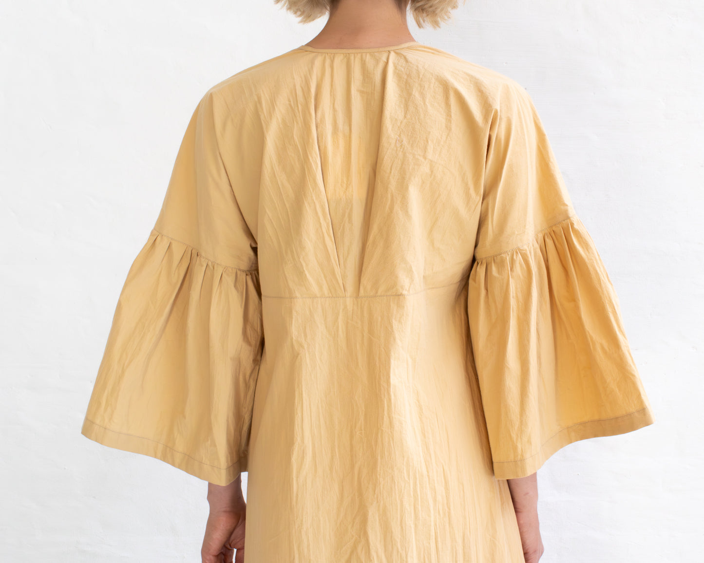 FULL BUTTON BELL SLEEVE DRESS IN YELLOW