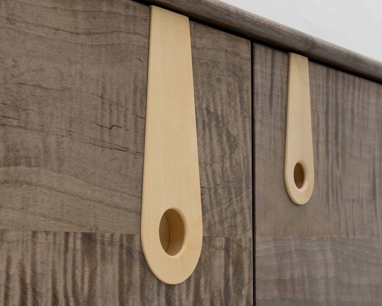 CAYESS CREDENZA - 95" L, OXIDIZED OIL TIGER MAPLE EXTERIOR AND FACES, HOLLY PULLS