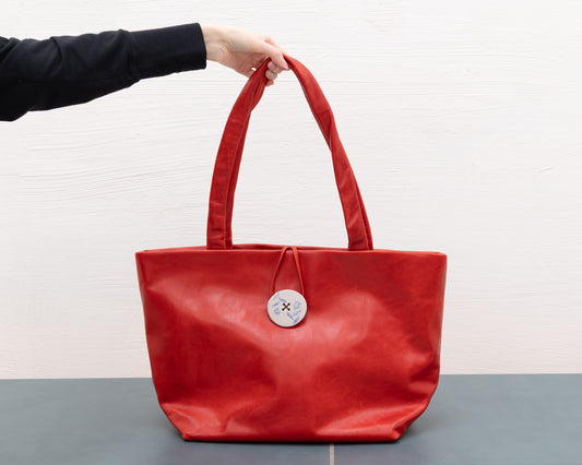 LEATHER PURSE WITH CERAMIC BUTTON (ED. 2/7)