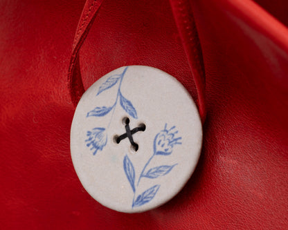LEATHER PURSE WITH CERAMIC BUTTON (ED. 2/7)