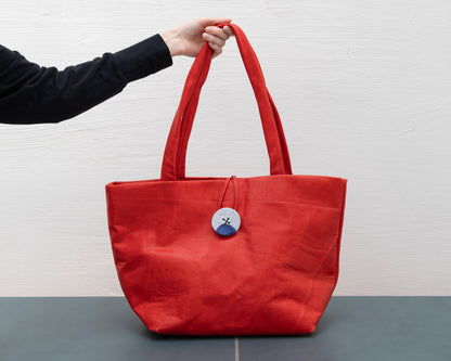 LEATHER PURSE WITH CERAMIC BUTTON (ED. 4/7)