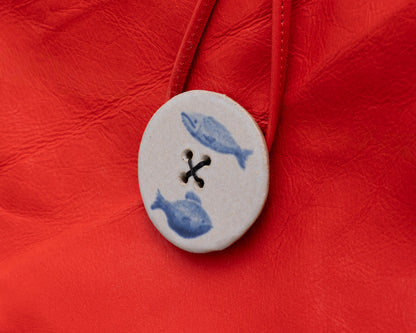 LEATHER PURSE WITH CERAMIC BUTTON (ED. 5/7)