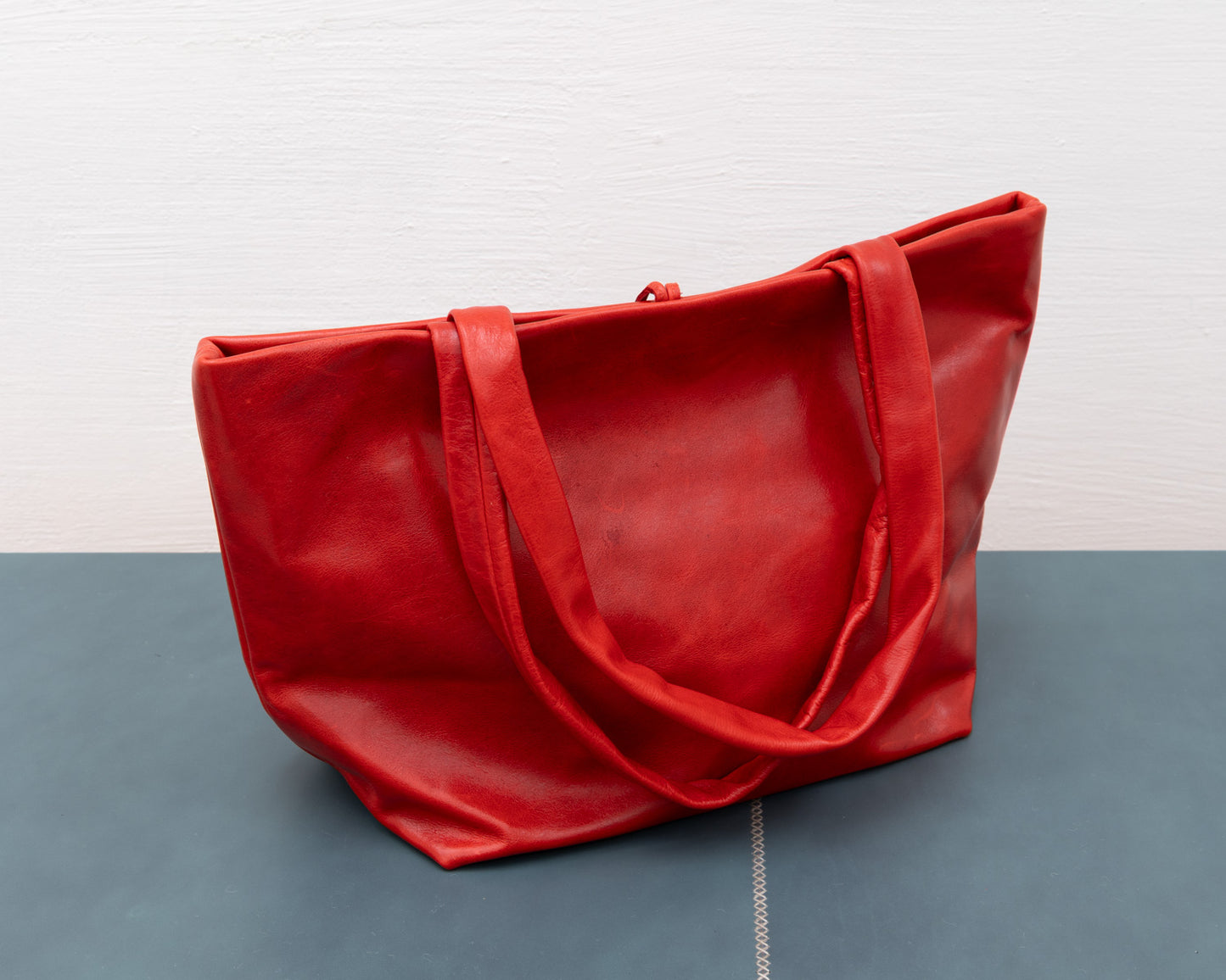 LEATHER PURSE WITH CERAMIC BUTTON (ED. 6/7)