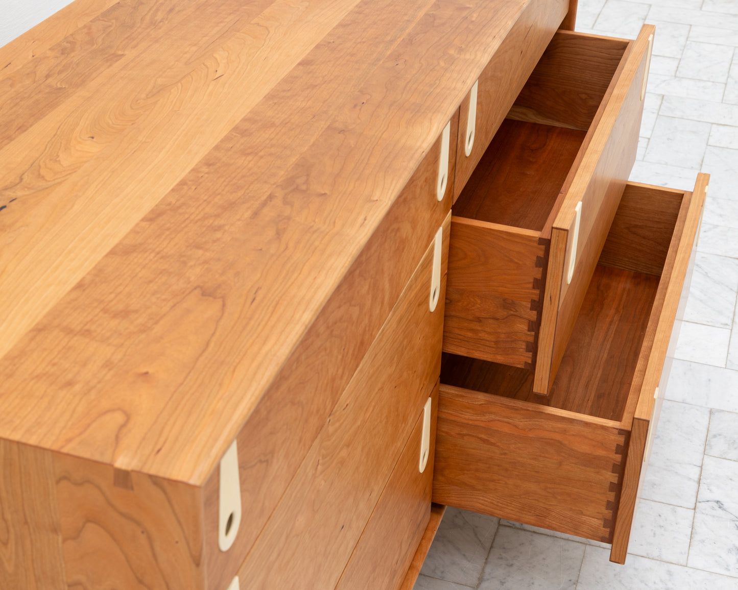 CAYESS DRESSER - 61" L, CHERRY EXTERIOR AND FACES, BLEACHED MAPLE PULLS