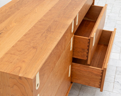 CAYESS DRESSER - 61" L, CHERRY EXTERIOR AND FACES, BLEACHED MAPLE PULLS
