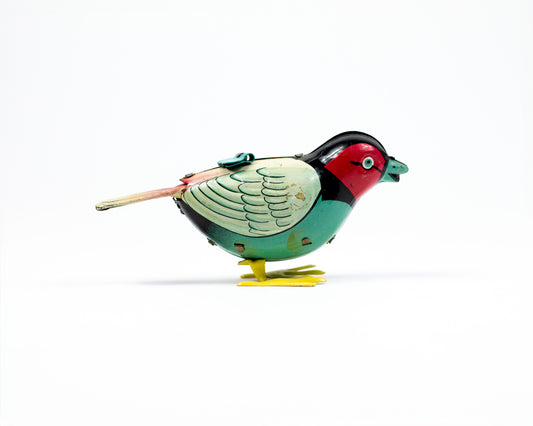 VINTAGE TIN WIND-UP BIRD TOY