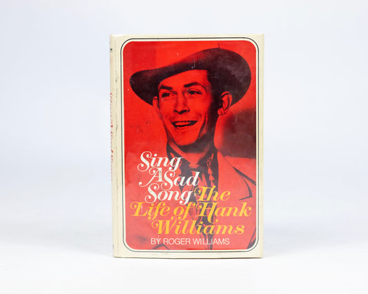 VINTAGE FIRST EDITION COPY OF "SING A SAD SONG: THE LIFE OF HANK WILLIAMS" BY ROGER WILLIAMS