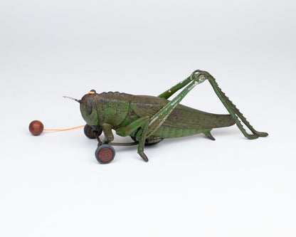 LARGE VINTAGE 1930S HUBLEY CAST IRON GRASSHOPPER ACTION PULL TOY