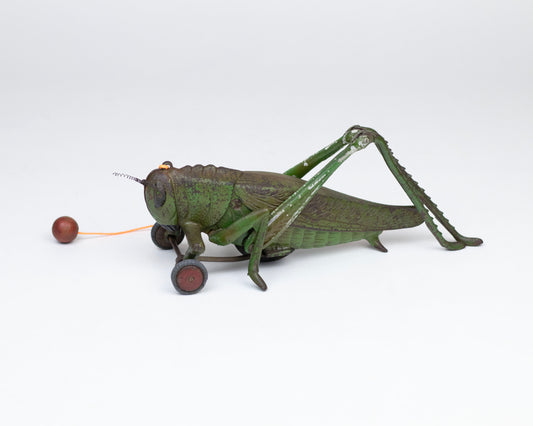 LARGE VINTAGE 1930S HUBLEY CAST IRON GRASSHOPPER ACTION PULL TOY
