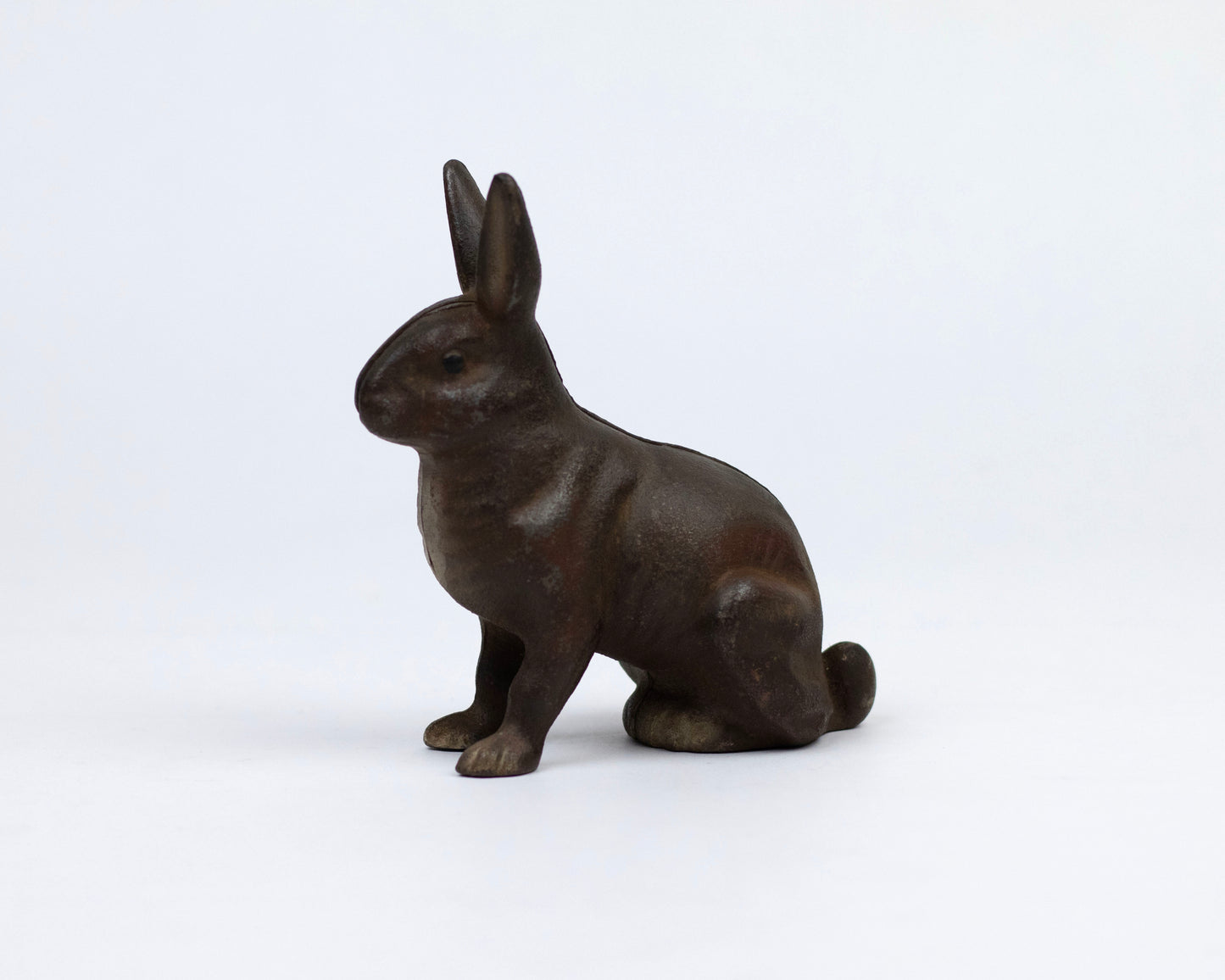 VINTAGE A.C. WILLIAMS CAST IRON RABBIT COIN BANK