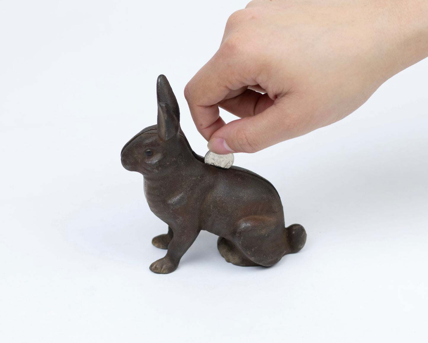 VINTAGE A.C. WILLIAMS CAST IRON RABBIT COIN BANK