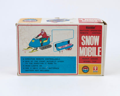 VINTAGE 1970S BANDAI BATTERY-OPERATED SNOWMOBILE TOY WITH BOX