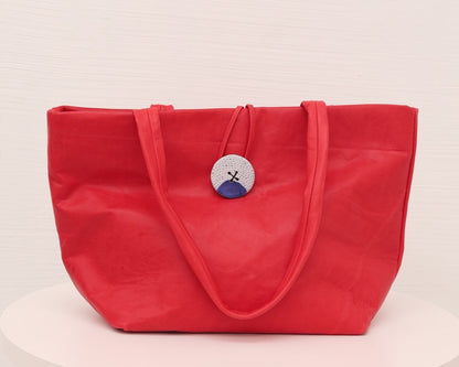 LEATHER PURSE WITH CERAMIC BUTTON (ED. 4/7)
