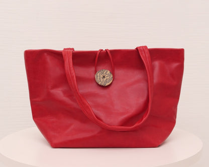 LEATHER PURSE WITH CERAMIC BUTTON (ED. 1/7)