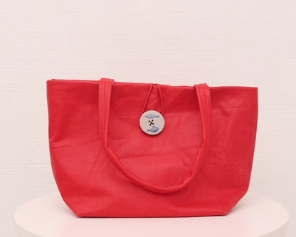 LEATHER PURSE WITH CERAMIC BUTTON (ED. 5/7)