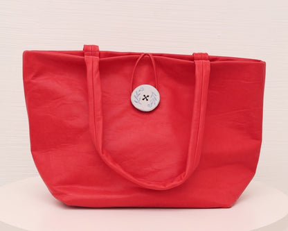 LEATHER PURSE WITH CERAMIC BUTTON (ED. 3/7)
