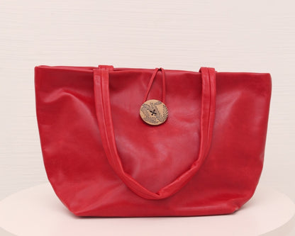 LEATHER PURSE WITH CERAMIC BUTTON (ED. 6/7)