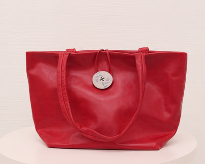 LEATHER PURSE WITH CERAMIC BUTTON (ED. 2/7)