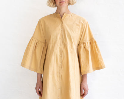 FULL BUTTON BELL SLEEVE DRESS IN YELLOW